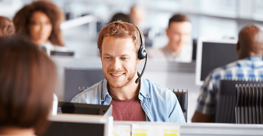 man using headset in office