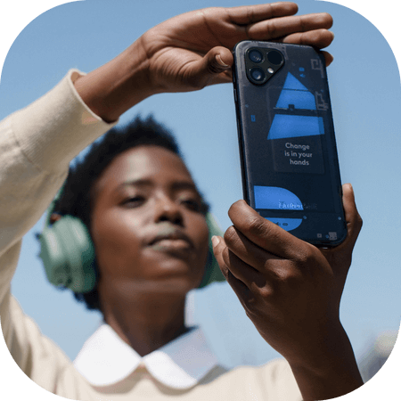 Woman taking a picture with her fairphone
