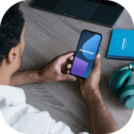 Man using his phone at work