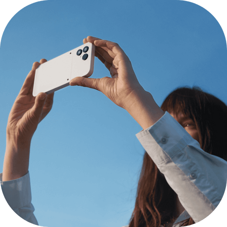 Women taking a picture with a Fairphone 6