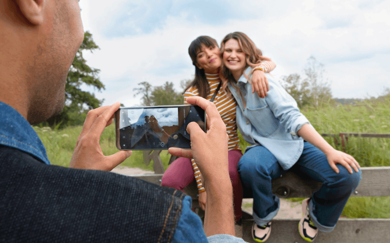 Group of people taking a selfie on a Fairphone 4